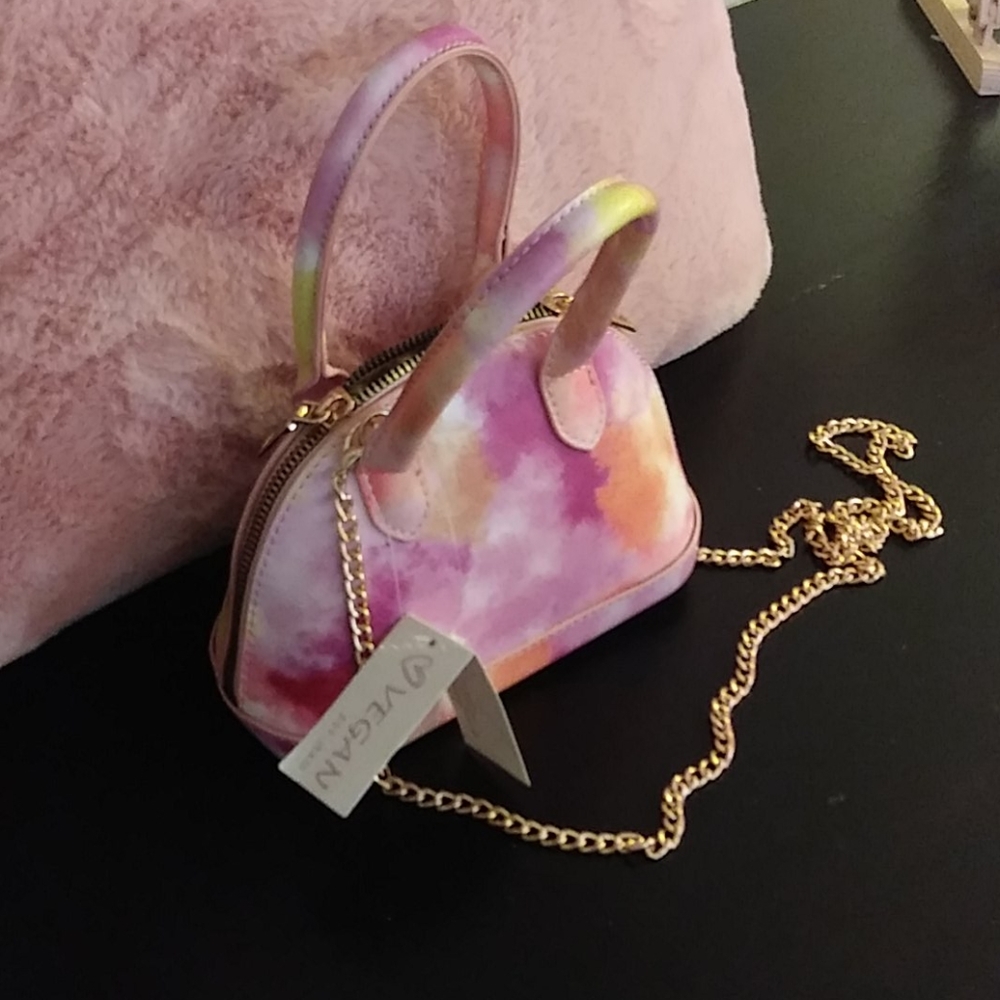 Pink multi colored small 👛 purse.